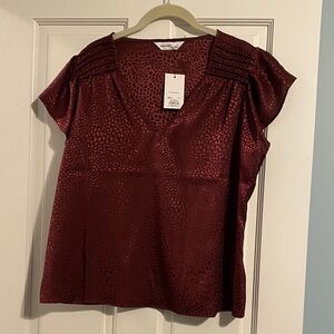 New With Tag! Cap sleeve ladies V-neck burgundy color blouse.